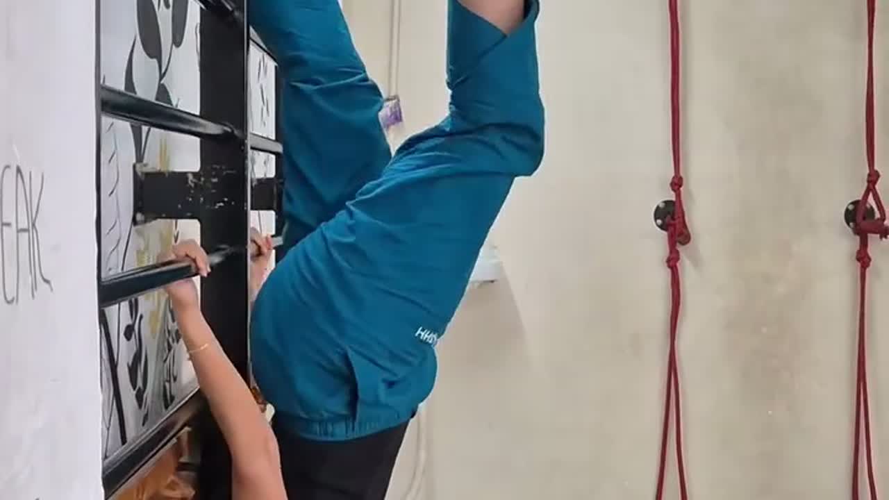 Yoga instructor teaching students in Surat